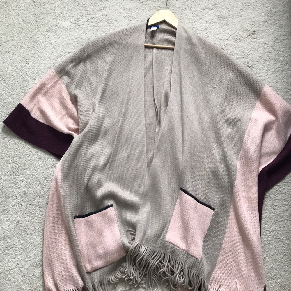 Tan poncho with fringe!